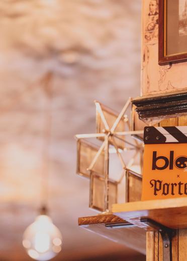 clapper board on a shelf inside Porter's