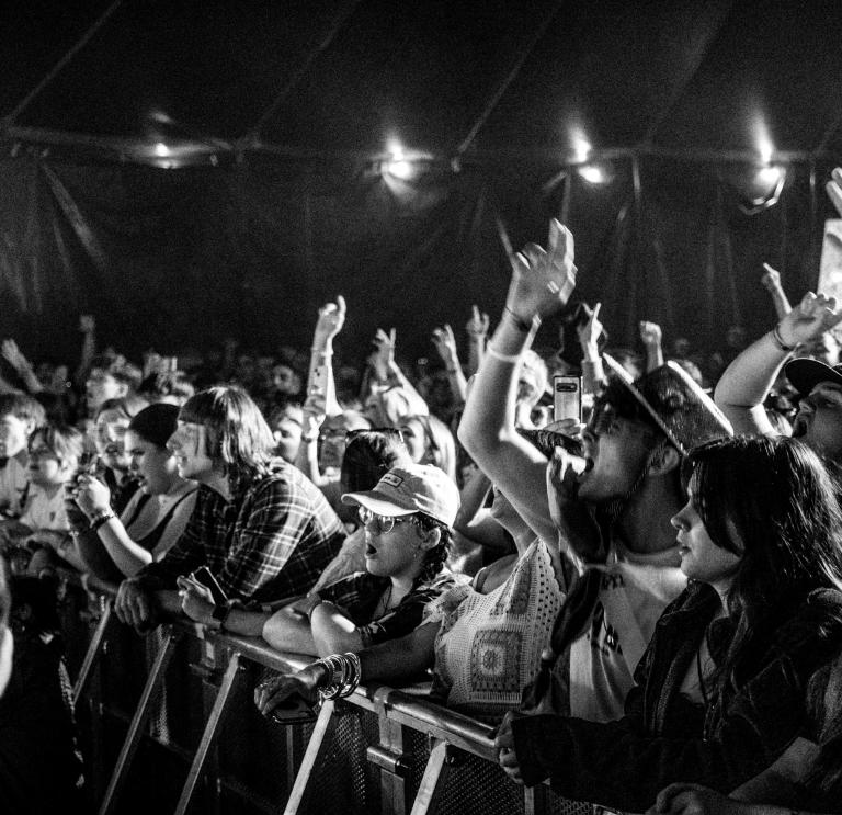 black and white image of a packed crowd line at the Focus Festival
